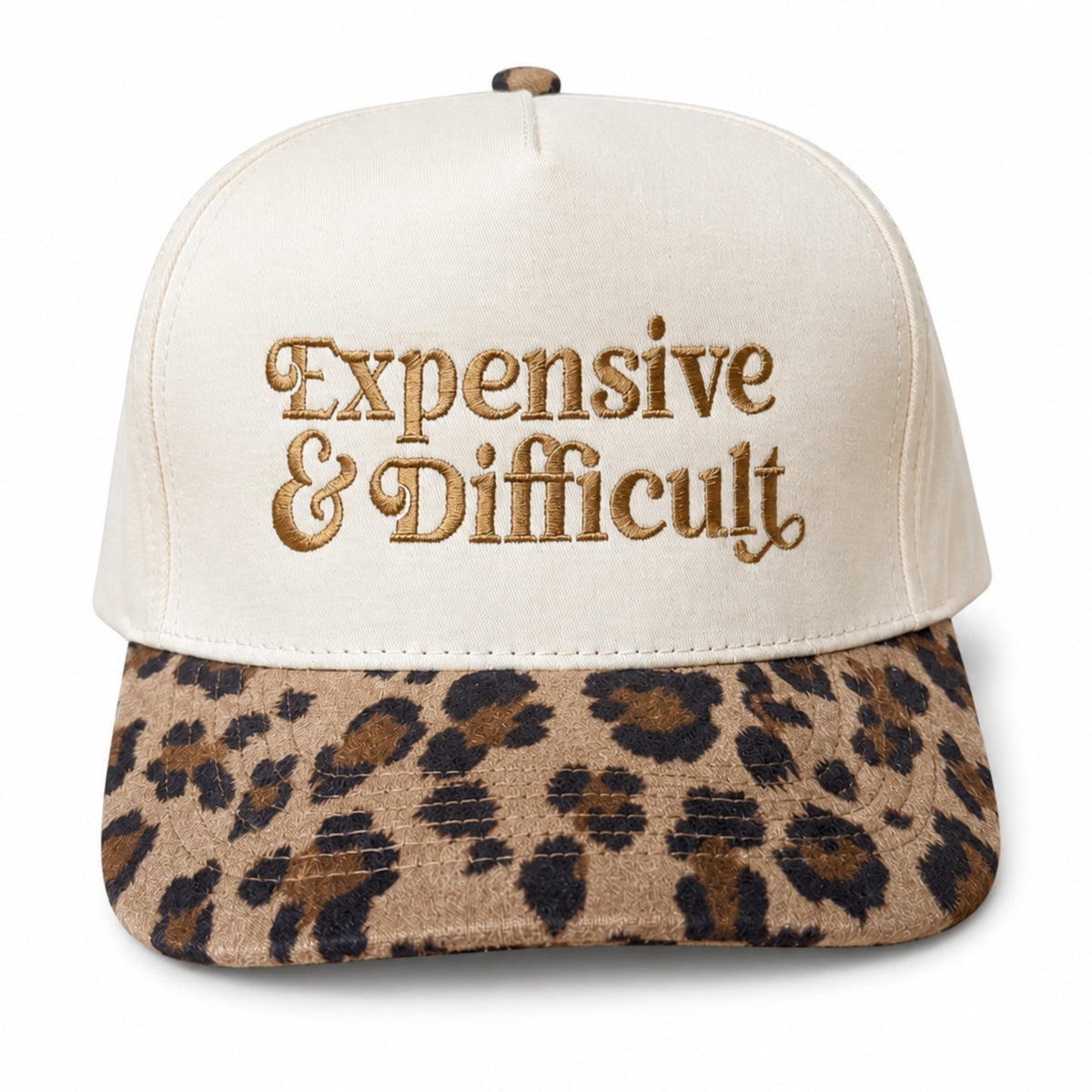 Natural five-panel trucker hat with a leopard bill and Expensive and Difficult embroidered in gold