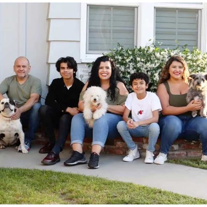 Our DSY Lifestyle family from left to right Orlando holding our pitbull dog wiggles Alexandro Daisy holding our white maltipoo dog Snow Jamil and Priscilla holding our Maltisee mix dog Kobe - DSY Lifestyle