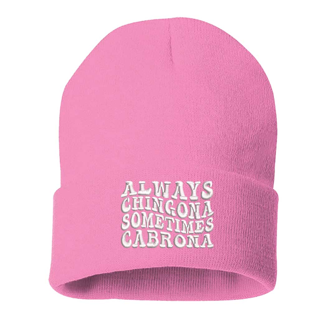 A cozy knit pink beanie embroidered with Always Chingona, Sometimes Cabrona, perfect for bold Spanglish style and fierce winter vibes - DSY Lifestyle