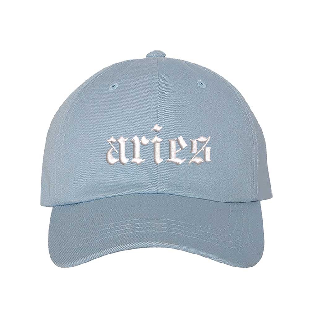 Light Blue Aries Embroidered Baseball Hat featuring crisp white Aries script on a premium cotton crown; a bold astrological statement piece by DSY Lifestyle.