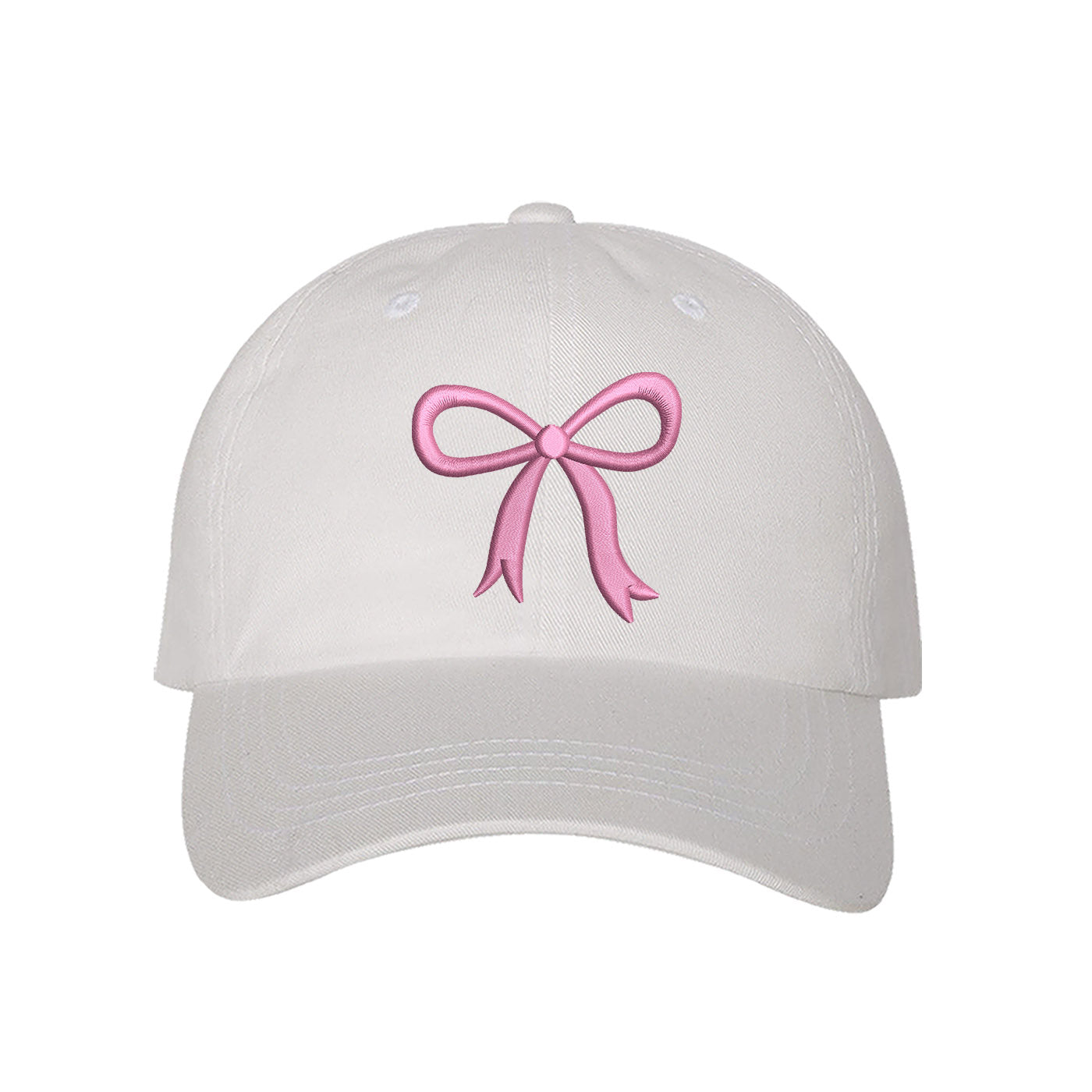 White Bow Baseball Hat featuring a dainty pink embroidered bow on a classic cap, perfect for a coquette-style outfit or a feminine statement accessory.