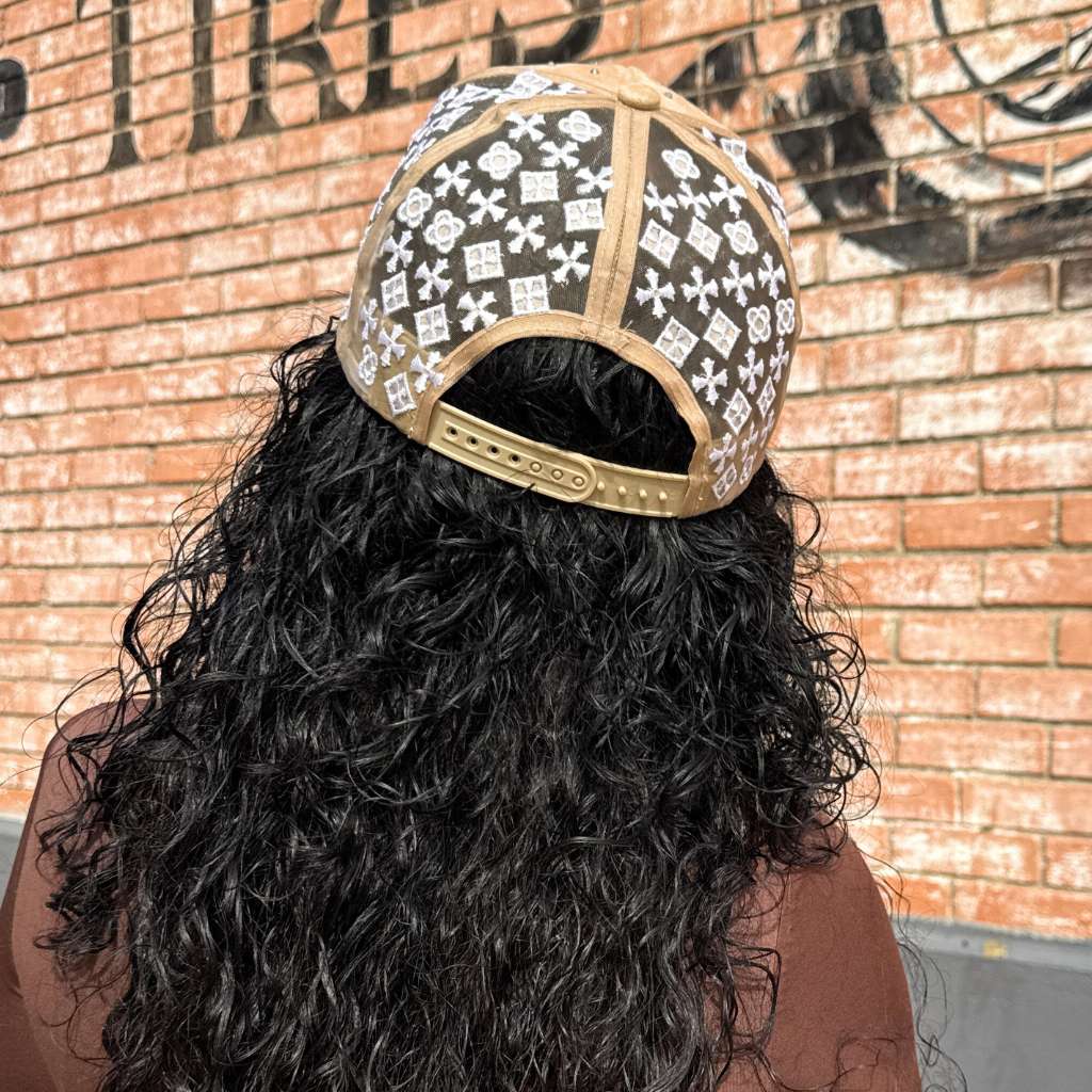 back of hat woman wearing Puerto Rico PR rhinestone trucker hat Puerto Rican streetwear cap