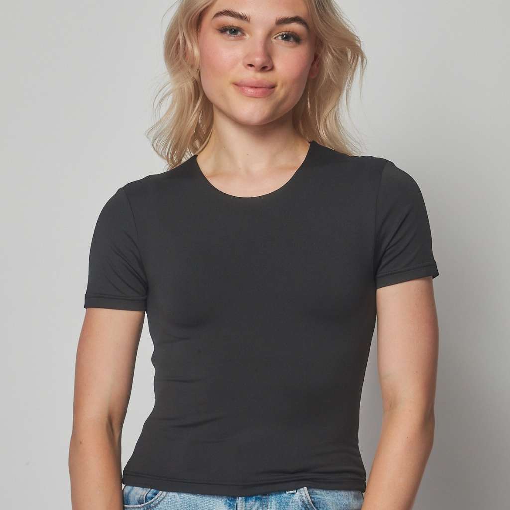 Close up of female wearing a crew neck double layer crop top in Black - DSY Lifestyle