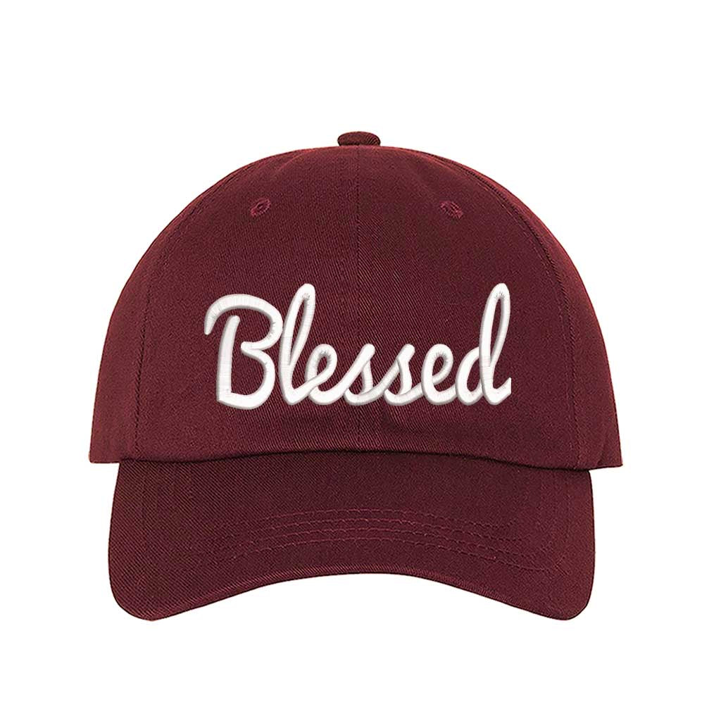 Burgundy detailed close-up of the premium thread embroidery showing the clean lines of the word Blessed on a textured fabric. - DSY Lifestyle