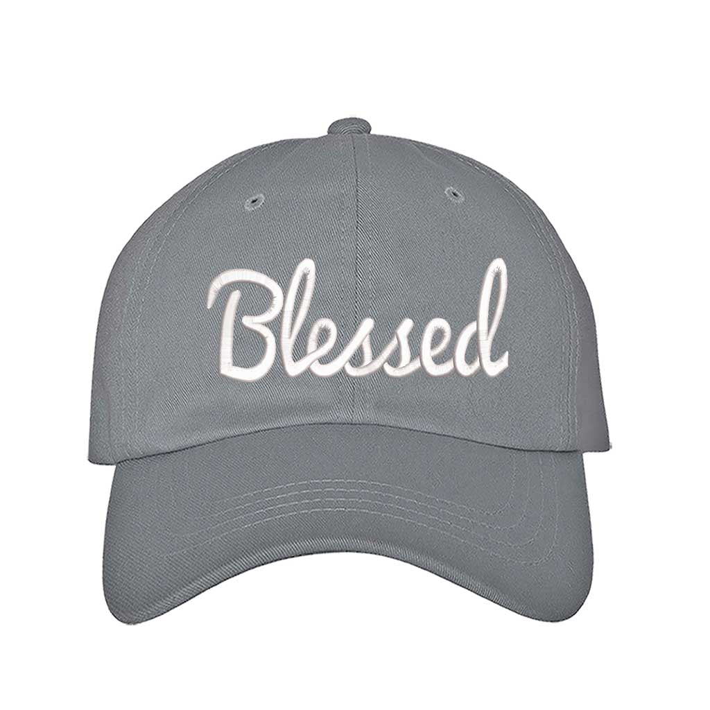 Gray detailed close-up of the premium thread embroidery showing the clean lines of the word Blessed on a textured fabric. - DSY Lifestyle