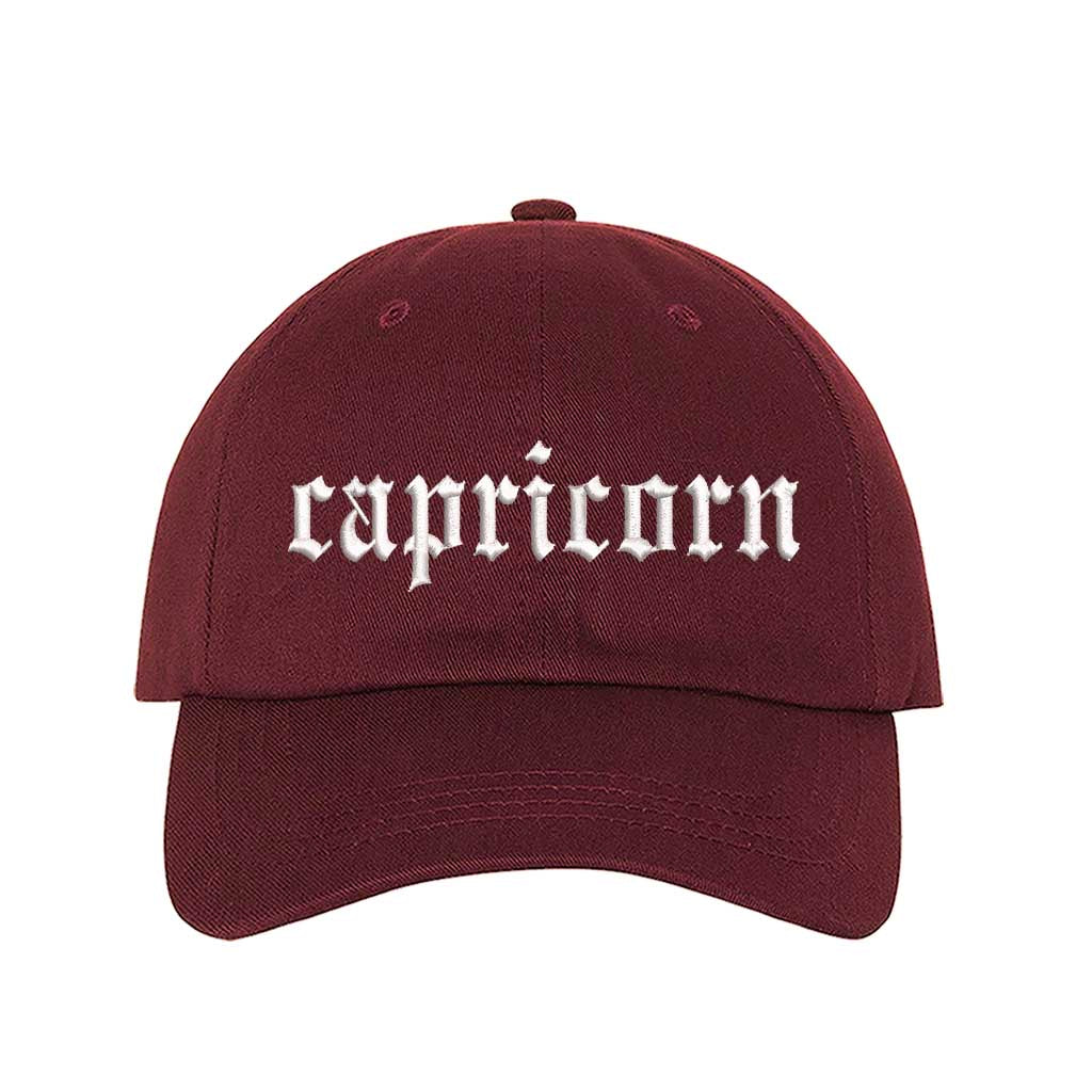 Burgundy Capricorn Baseball Hat, a zodiac statement hat for confident, goal-driven style with everyday appeal. DSY Lifestyle.