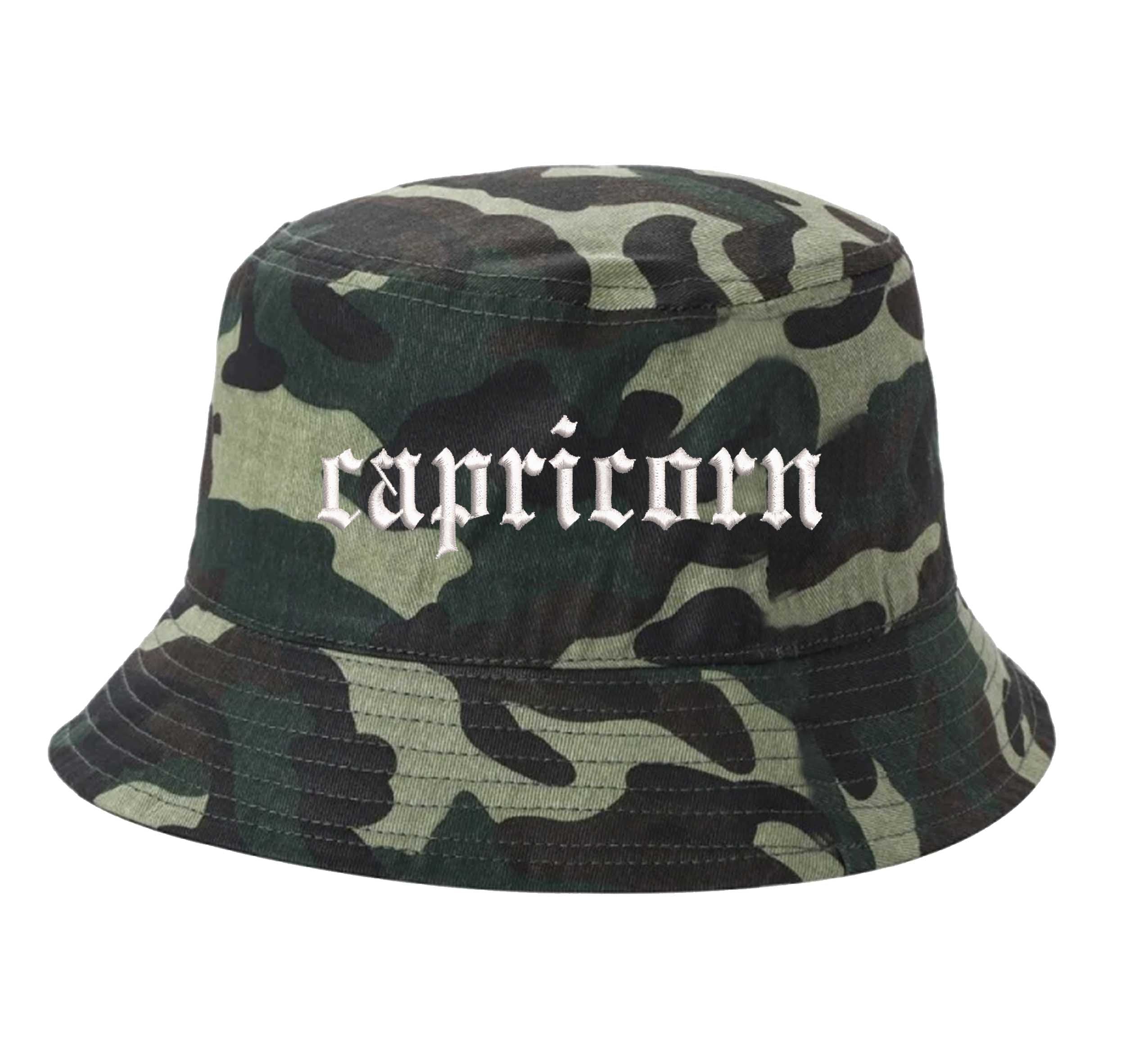 Camo Capricorn Bucket Hat, a zodiac statement hat for confident, grounded style with an effortless edge. DSY Lifestyle.