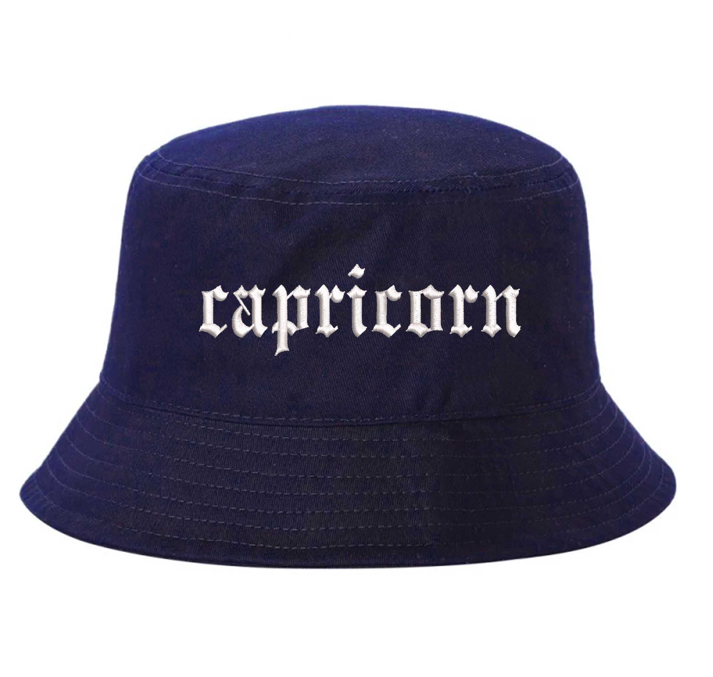 Navy Blue Capricorn Bucket Hat, a zodiac statement hat for confident, grounded style with an effortless edge. DSY Lifestyle.