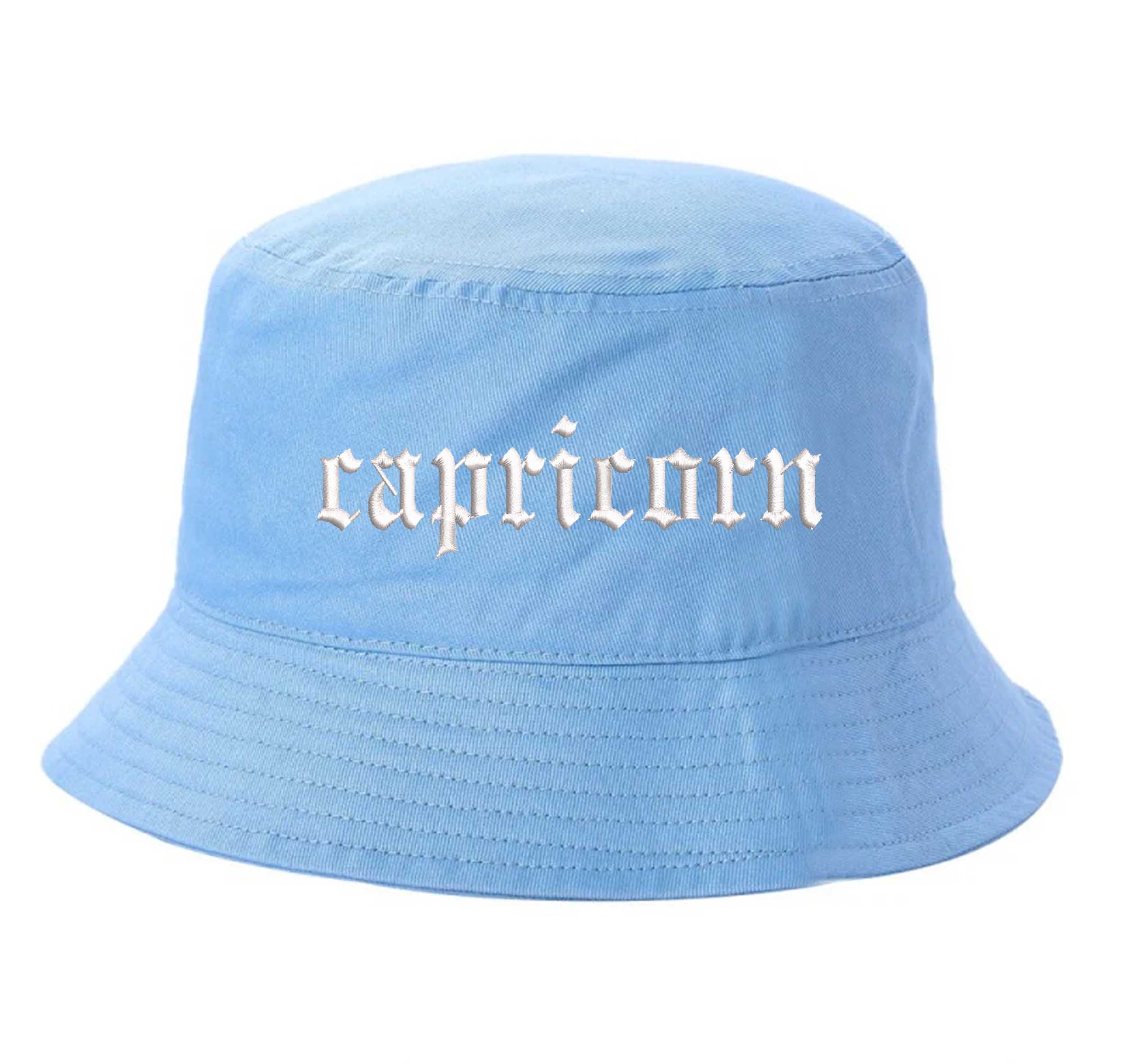 Sky Blue Capricorn Bucket Hat, a zodiac statement hat for confident, grounded style with an effortless edge. DSY Lifestyle.