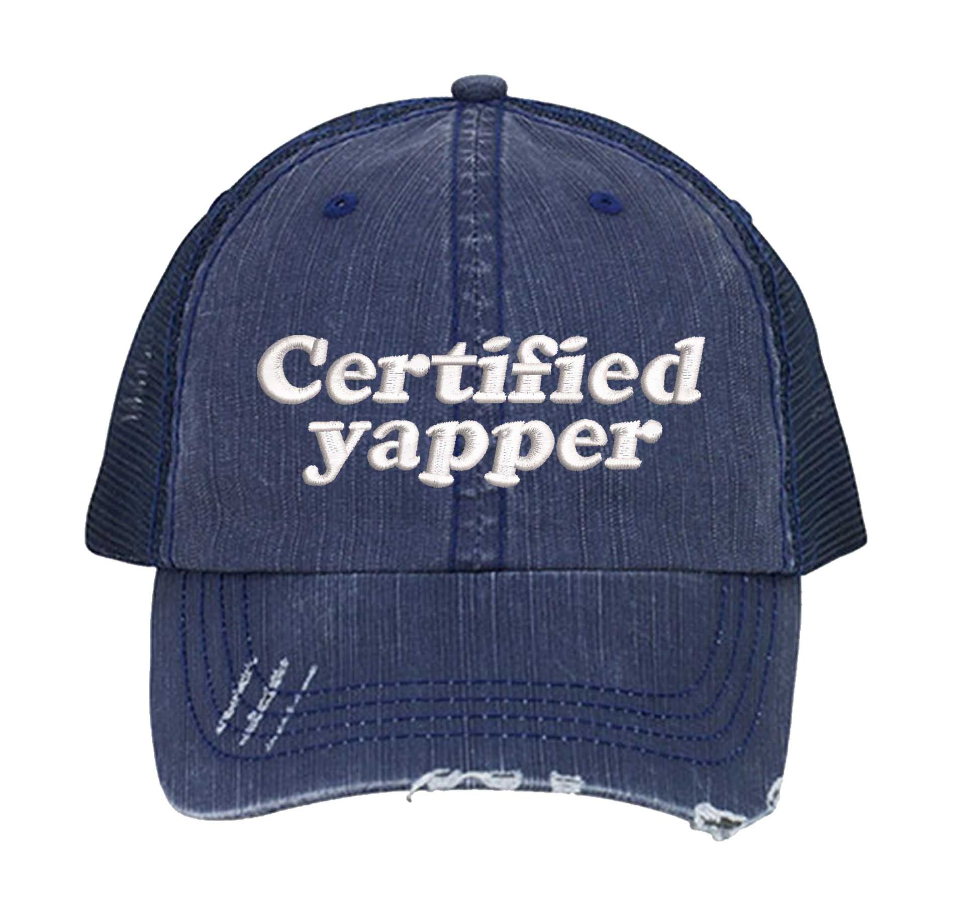 Navy Blue DSY Lifestyle distressed trucker hat featuring the phrase Certified Yapper in bold, professional embroidery. - DSY Lifestyle