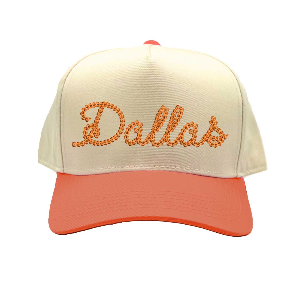 Spring 5 panel hat that has Dallas embroidered in a chain stitch. The hats is Natural Crown with Orange bill for Spring Fashion - DSY Lifestyle