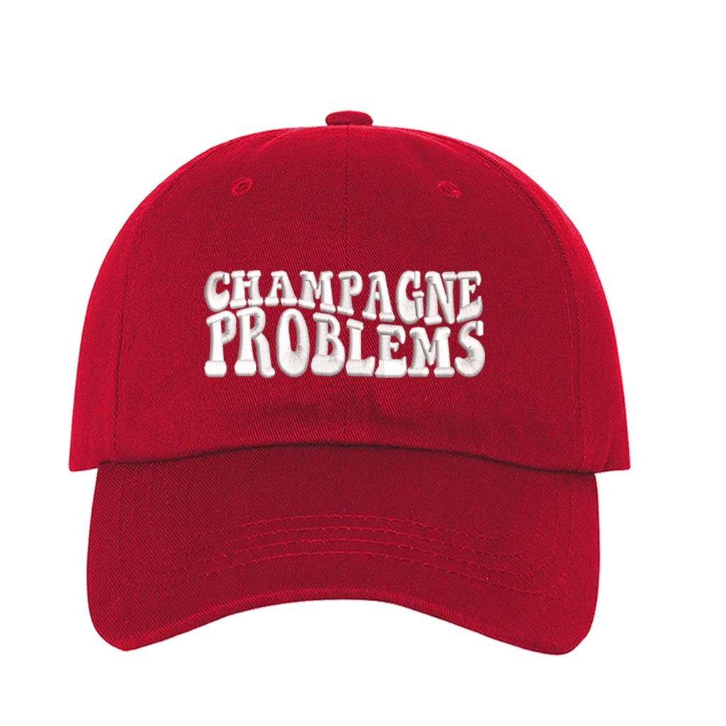 Red baseball hat embroidered with the phrase champagne problems-DSY Lifestyle
