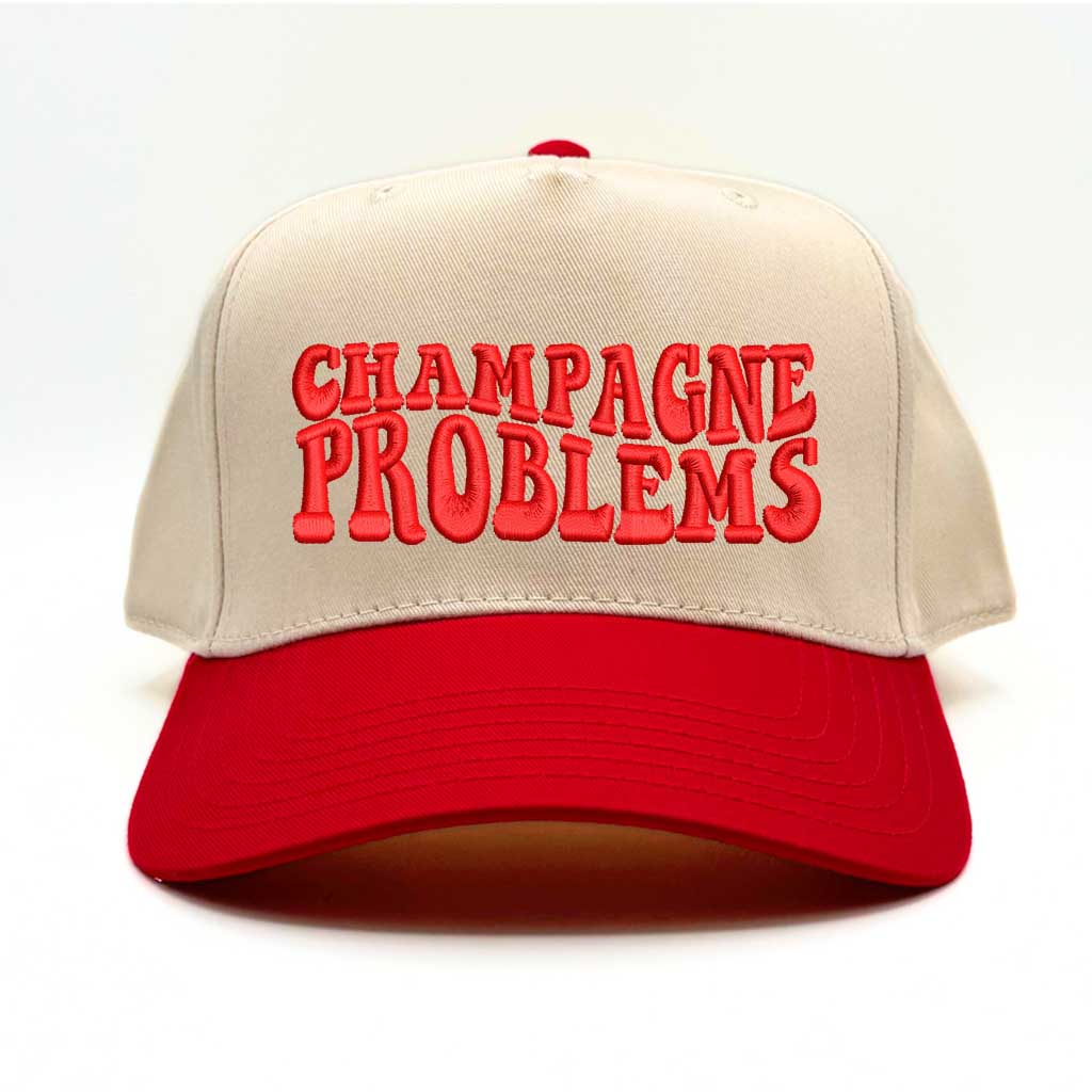 Natural color baseball hat with red bill and the phrase champagne problems in red embroidery-DSY Lifestyle