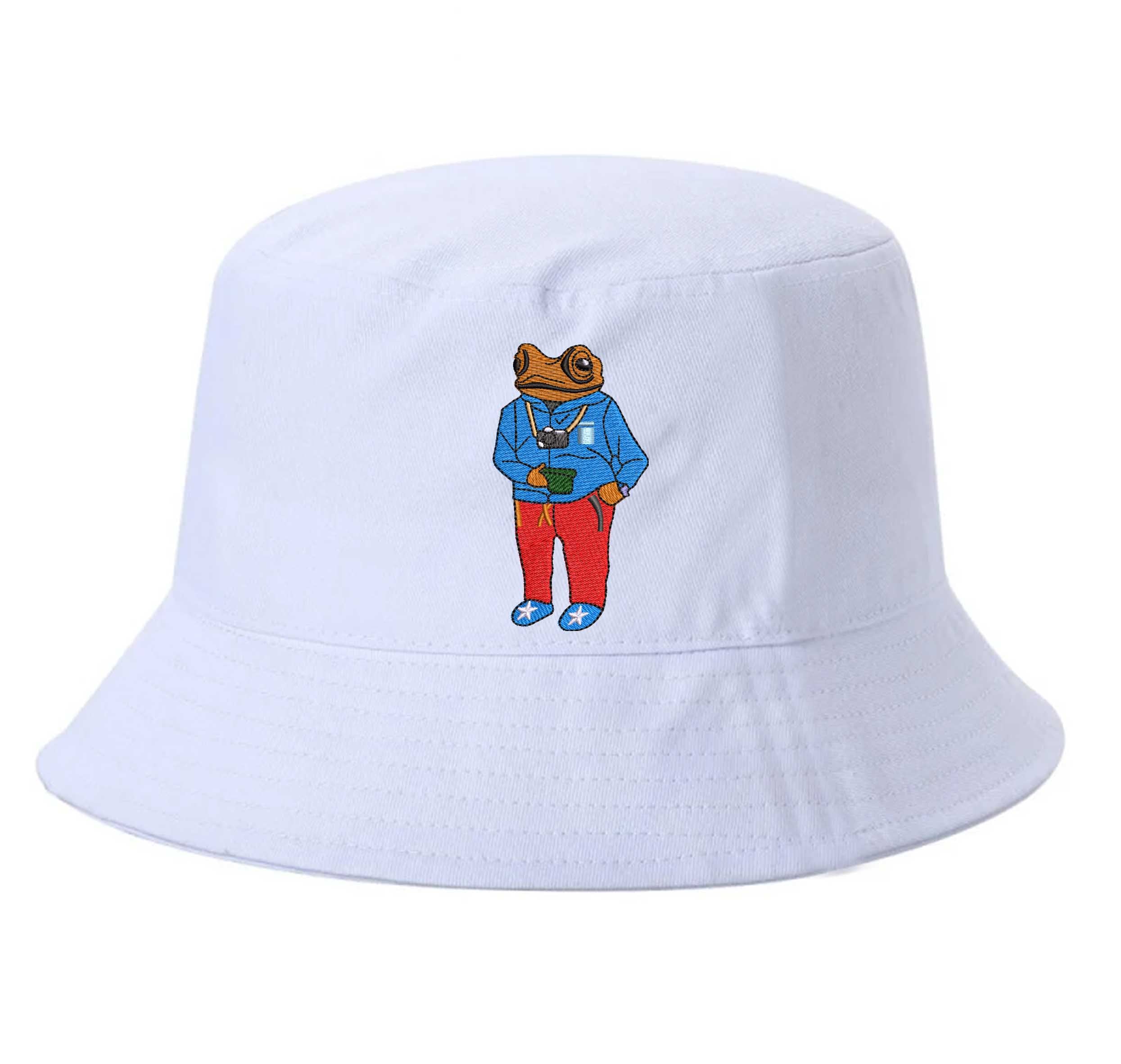 White Front view of a 100% cotton bucket hat featuring a detailed Sapo Concho (Puerto Rican Crested Toad) in high-density embroidery on the center. - DSY Lifestyle