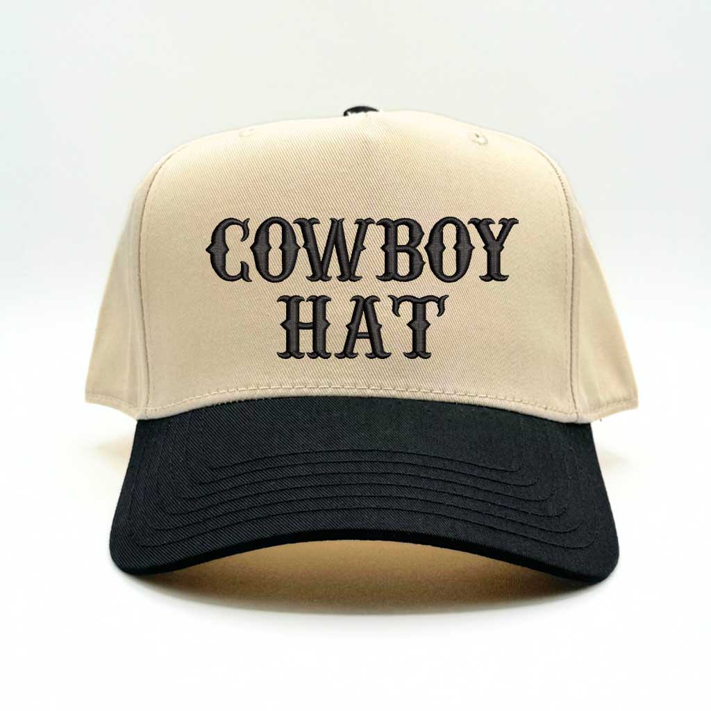 Natural colored baseball hat embroidered with the phrase cowboy hat in black embroidery and black bill-DSY Lifestyle