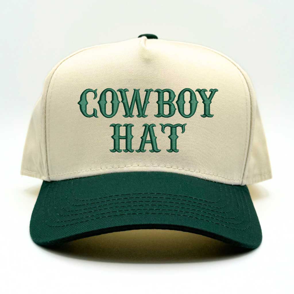 Natural colored baseball hat embroidered with the phrase cowboy hat in forest green embroidery and forest green bill-DSY Lifestyle