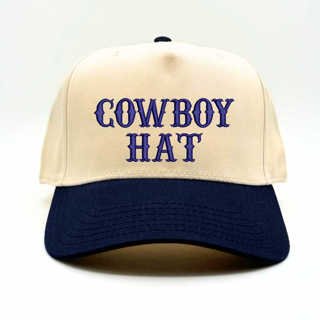 Natural colored baseball hat embroidered with the phrase cowboy hat in navy embroidery and navy bill-DSY Lifestyle