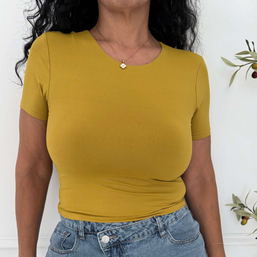 Close up of female wearing a crew neck double layer crop top in mustard color
- DSY Lifestyle