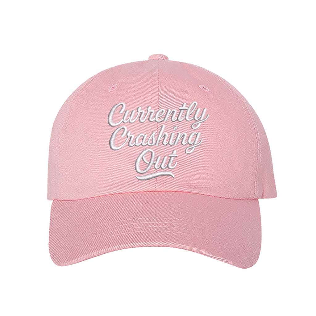 Light Pink Currently Crashing Out embroidered baseball hat. A statement baseball hat for women who love humor, comfort, and effortless everyday outfits. - DSY Lifestyle