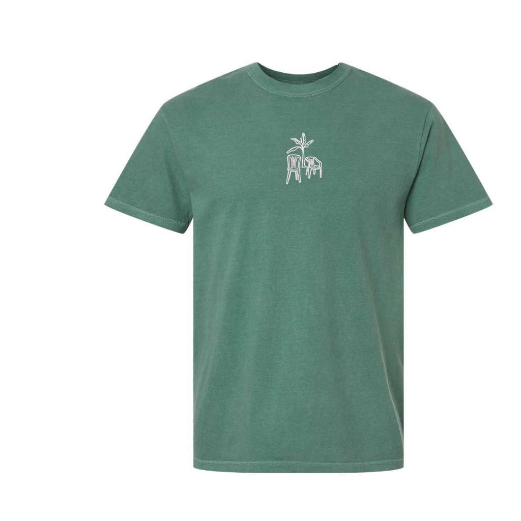 Bay green Comfort Colors washed oversized t-shirt from DSY Lifestyle, featuring the DTMF embroidered design of a platano tree with two chairs on the front.