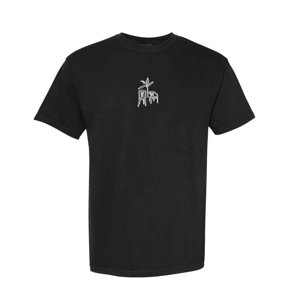 Black Comfort Colors washed oversized t-shirt from DSY Lifestyle showcasing the DTMF embroidered platano tree and two chairs design on the front.