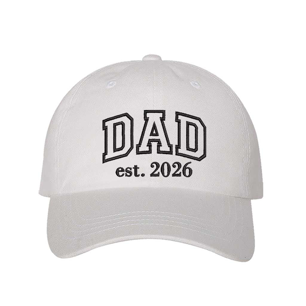 White Dad Est. 2026 Outline Baseball Hat featuring minimalist outline embroidery on a classic dad cap; a stylish 2026 baby announcement gift for new fathers by DSY Lifestyle.