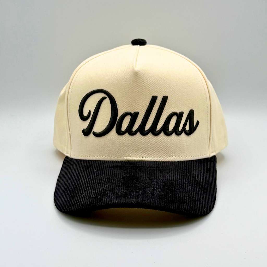 Beige and black cap with &