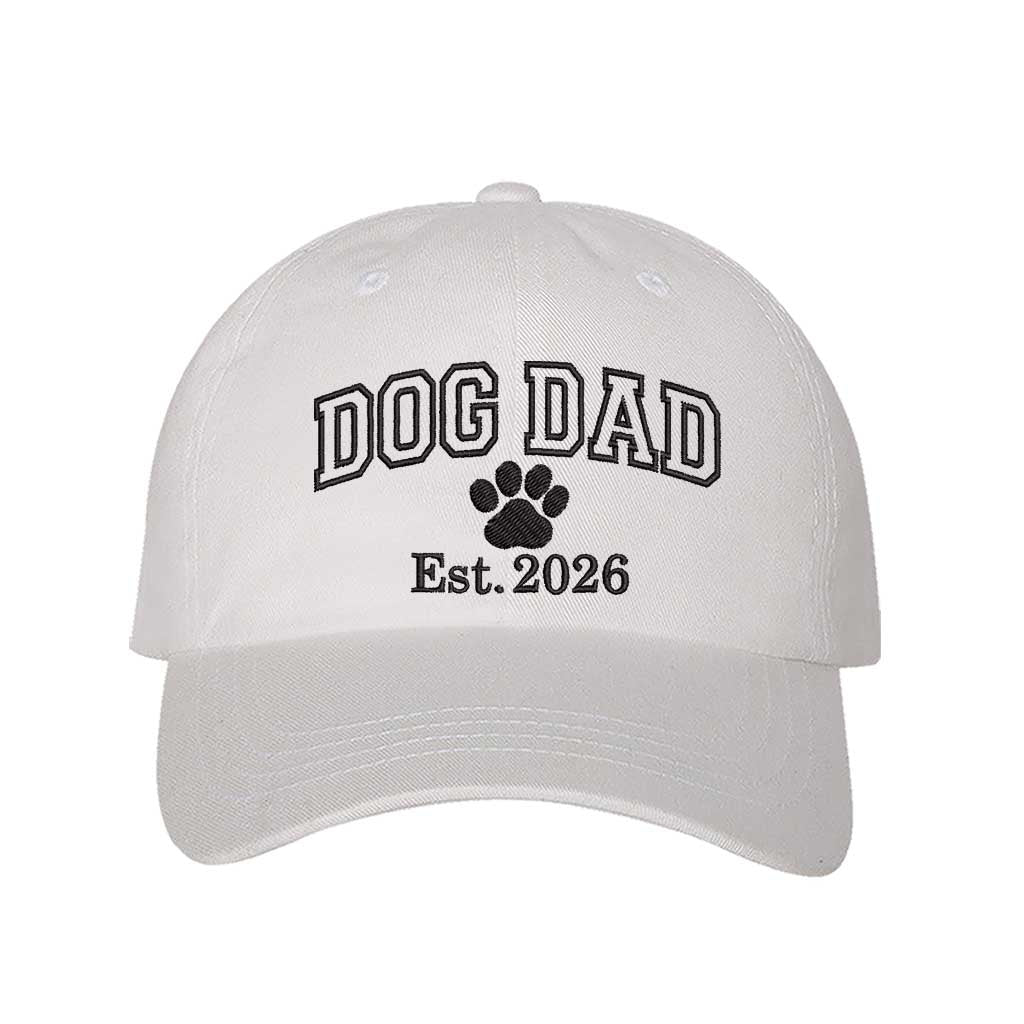 White Dog Dad Est. 2026 Embroidered Baseball Hat. The perfect gift for new dog owners in 2026, this premium cotton dad cap offers a comfortable, adjustable fit for every pet parent. - DSY Lifestyle