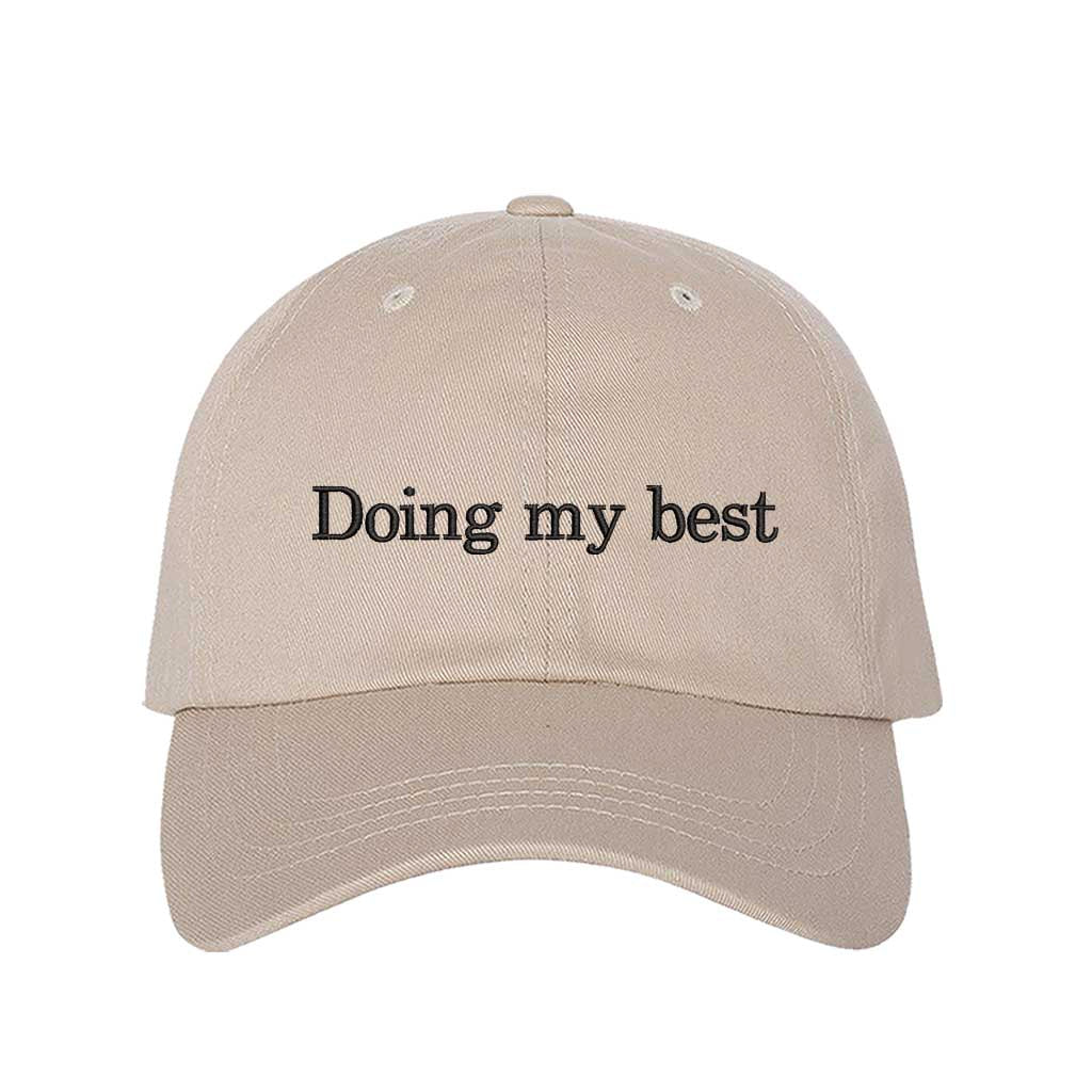 Stone close-up view of a DSY Lifestyle cotton baseball hat featuring the words Doing My Best in detailed professional embroidery. - DSY Lifestyle