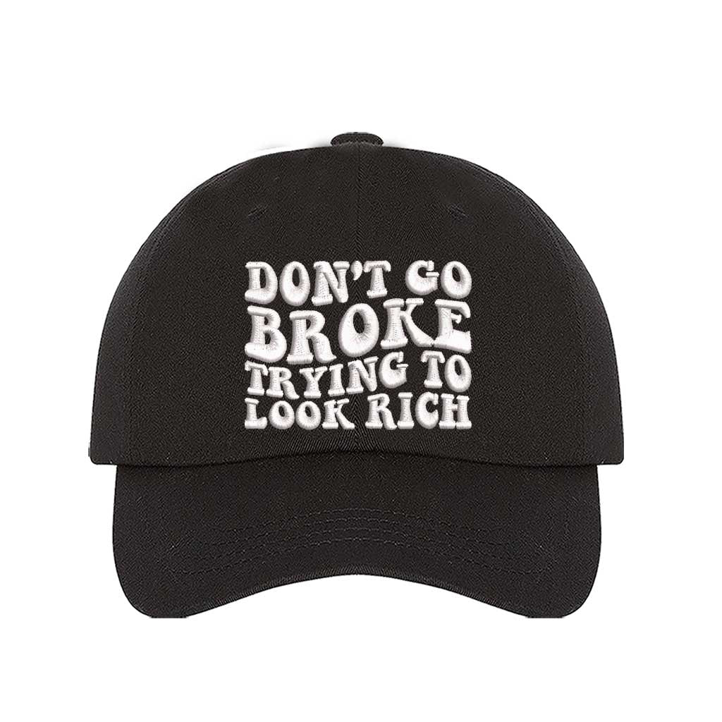 Black Don’t Go Broke Trying to Look Rich Embroidered Baseball Hat in soft cotton with curved brim and hook and loop closure. DSY Lifestyle.