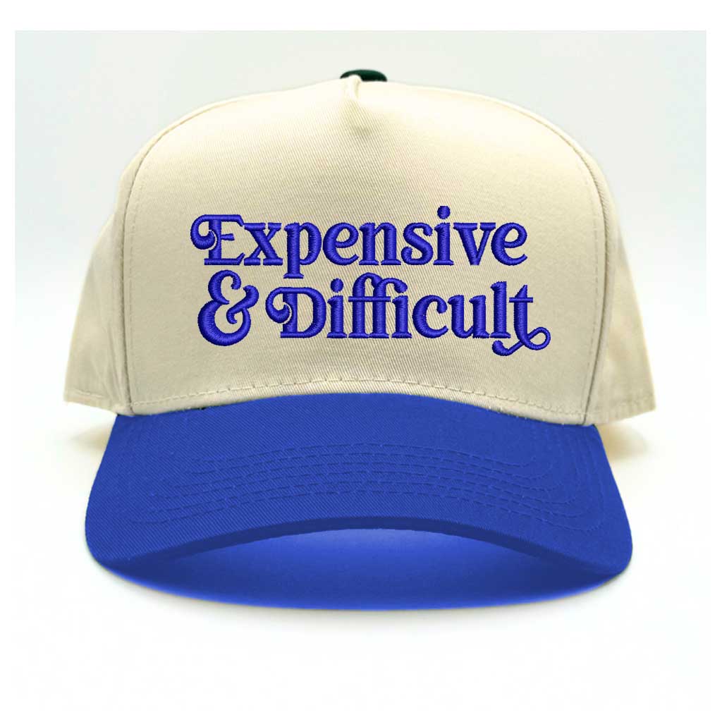 5 panel Natural color with Royal Blue bill baseball hat embroidered with the phrase Expensive & Difficult -DSY Lifestyle