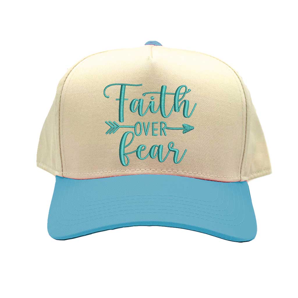 Natural Aqua close-up view of a DSY Lifestyle two-tone baseball hat with a neutral crown and contrast bill, featuring the words Faith Over Fear in bold, detailed embroidery. - DSY Lifestyle