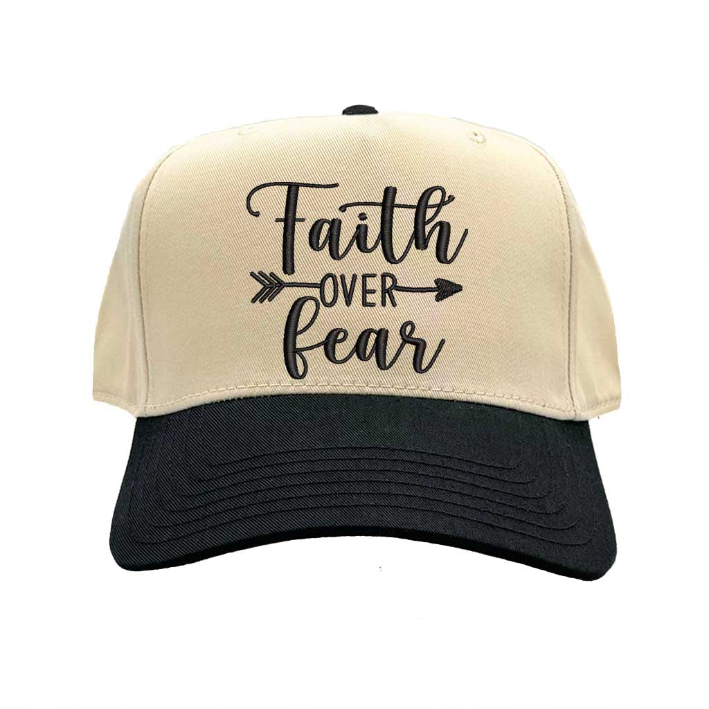 Natural Black close-up view of a DSY Lifestyle two-tone baseball hat with a neutral crown and contrast bill, featuring the words Faith Over Fear in bold, detailed embroidery. - DSY Lifestyle