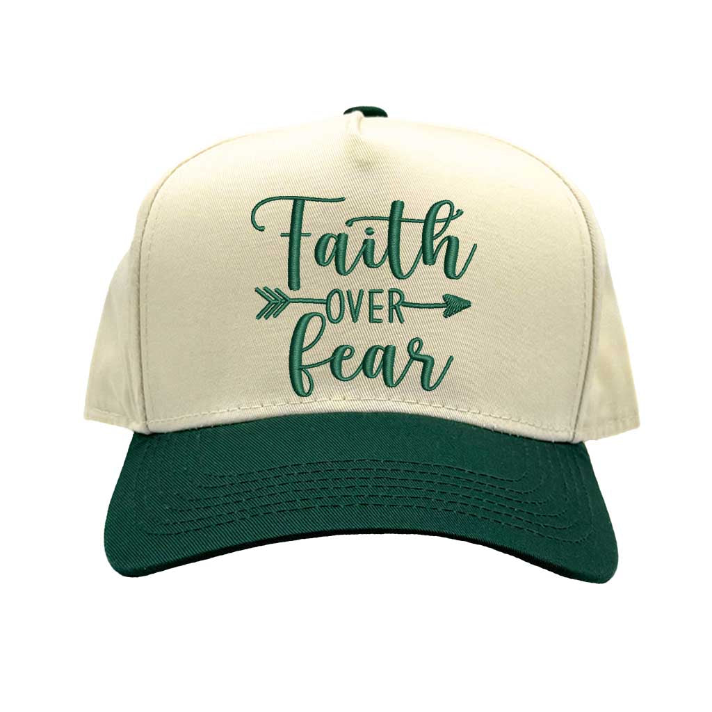 Natural Forest Green close-up view of a DSY Lifestyle two-tone baseball hat with a neutral crown and contrast bill, featuring the words Faith Over Fear in bold, detailed embroidery. - DSY Lifestyle