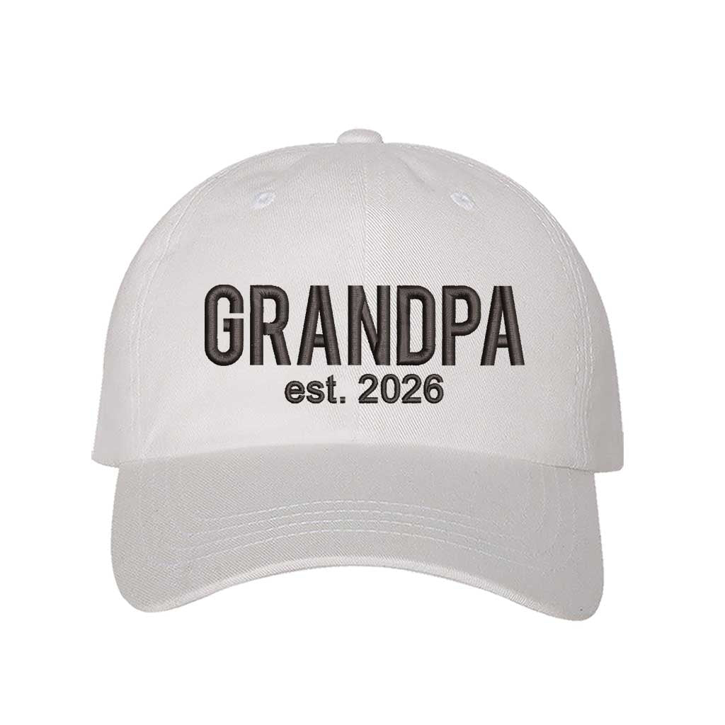 White Grandpa Est. 2026 Baseball Hat featuring bold black embroidery on a premium dad cap; a stylish 2026 announcement gift for new grandfathers by DSY Lifestyle.
