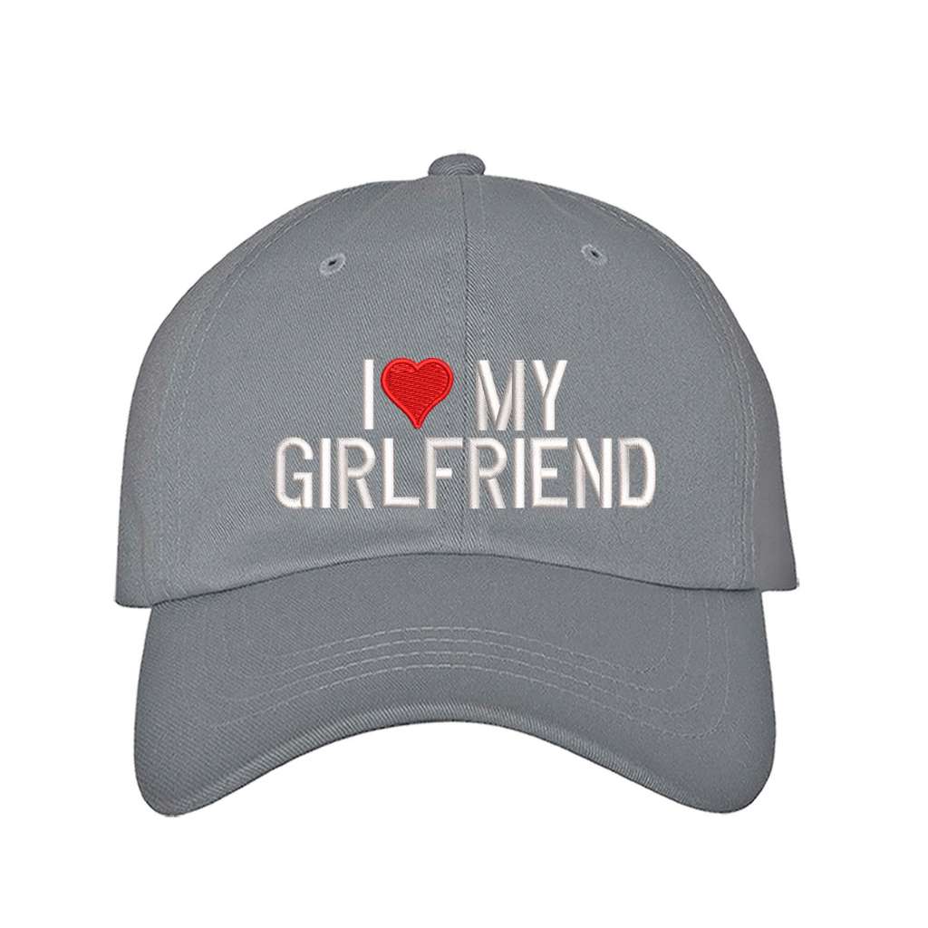 Grey baseball hat embroidered with the phrase i love my girlfriend but love is a heart- DSY Lifestyle