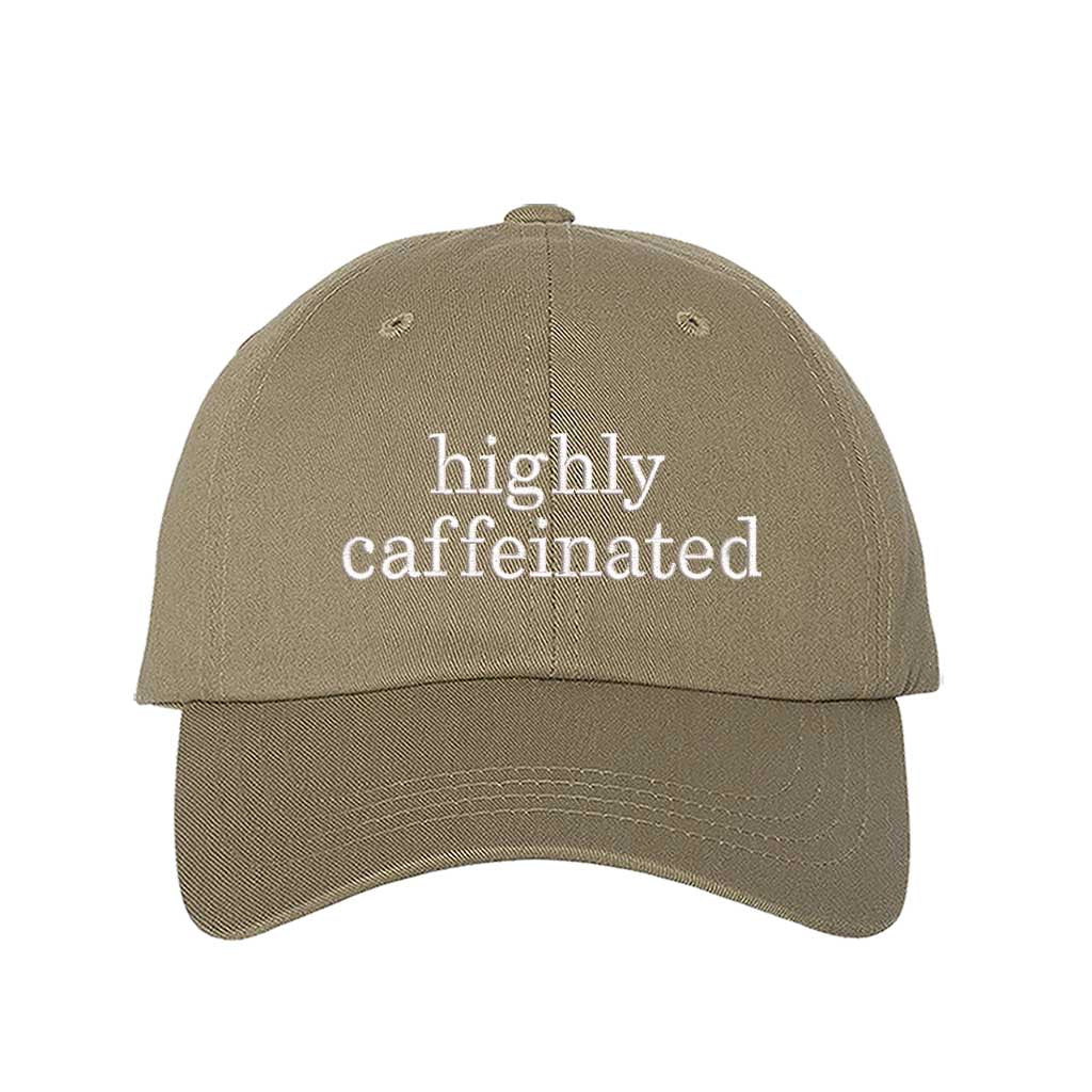 Khaki cotton baseball hat featuring the phrase Highly Caffeinated in bold, crisp white embroidery. - DSY Lifestyle