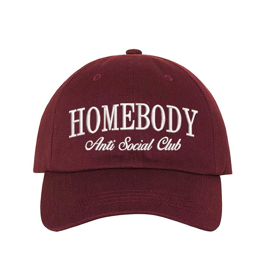Burgundy Homebody Anti Social Club embroidered baseball hat with minimalist white text on a premium dark cotton cap by DSY Lifestyle.