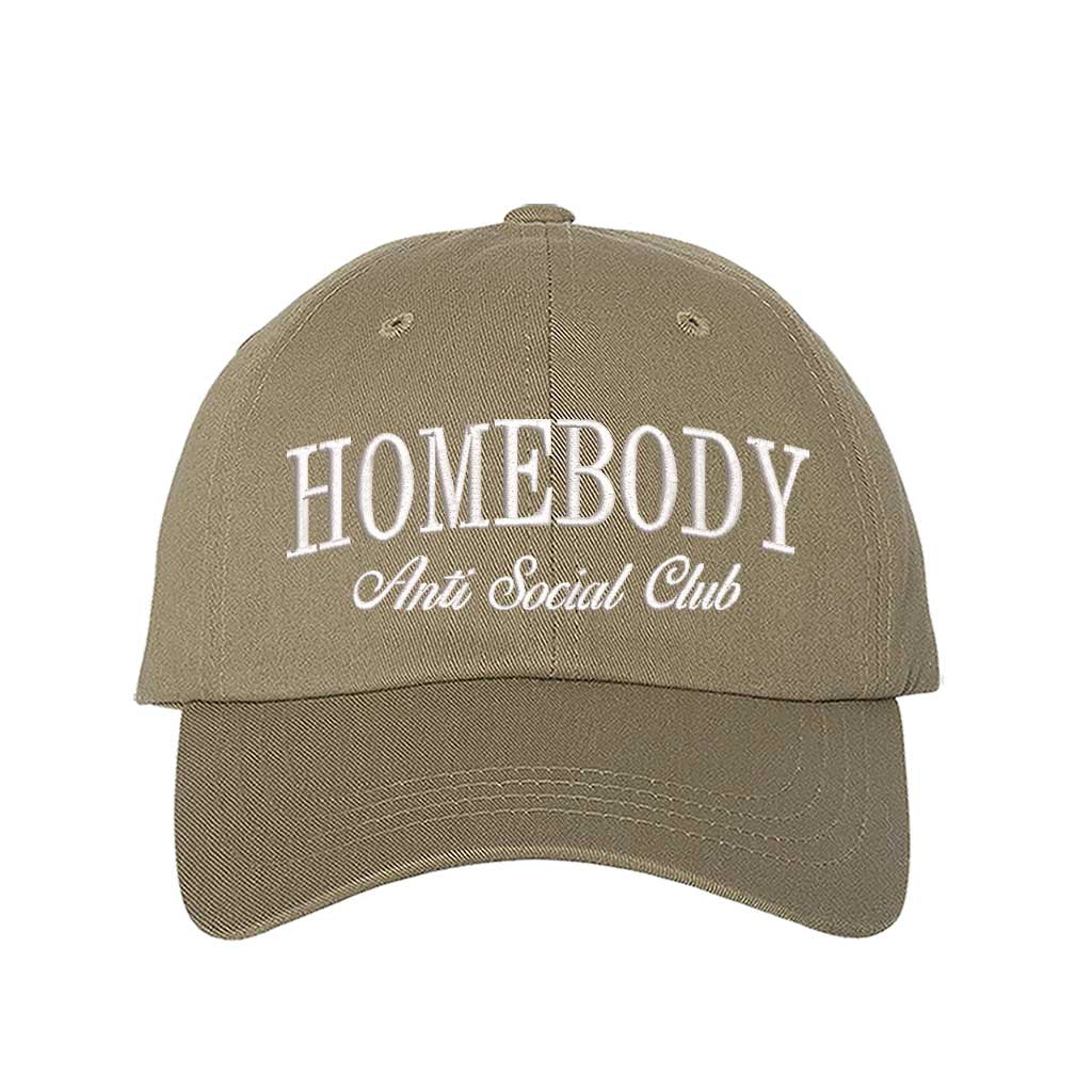 Khaki Homebody Anti Social Club embroidered baseball hat with minimalist white text on a premium dark cotton cap by DSY Lifestyle.