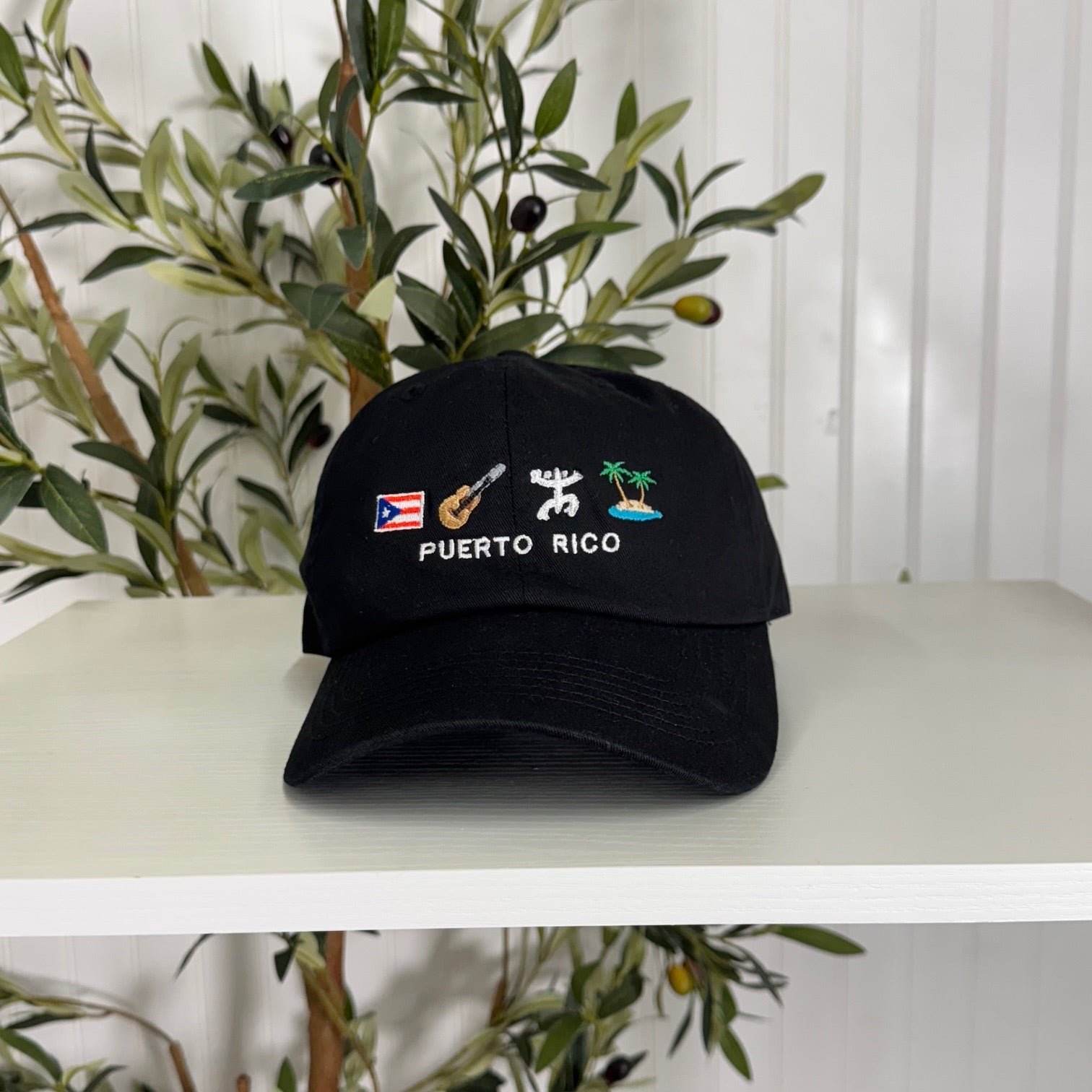 Black Puerto Rico 4 Logo Embroidered Baseball Hat featuring the PR flag, guitar, Taino sun, and palm tree island - DSY Lifestyle