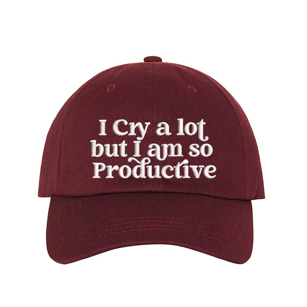 Burgundy I Cry A Lot But I Am So Productive Embroidered Baseball Hat in cotton with curved brim and hook and loop closure. - DSY Lifestyle.