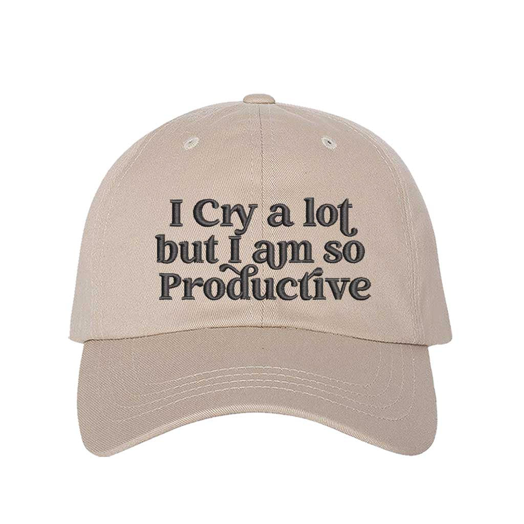 Stone I Cry A Lot But I Am So Productive Embroidered Baseball Hat in cotton with curved brim and hook and loop closure. - DSY Lifestyle.