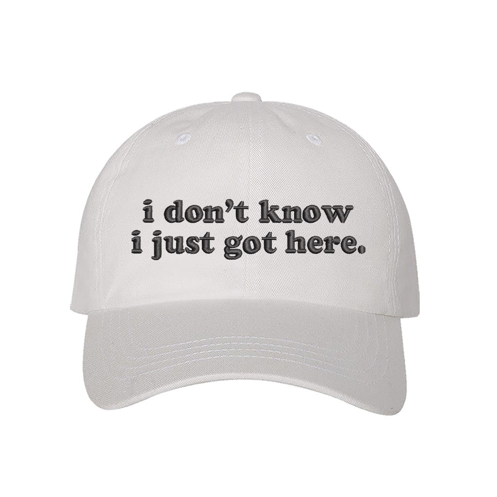 White baseball hat embroidered with the phrase i dont know i just got here-DSY Lifestyle