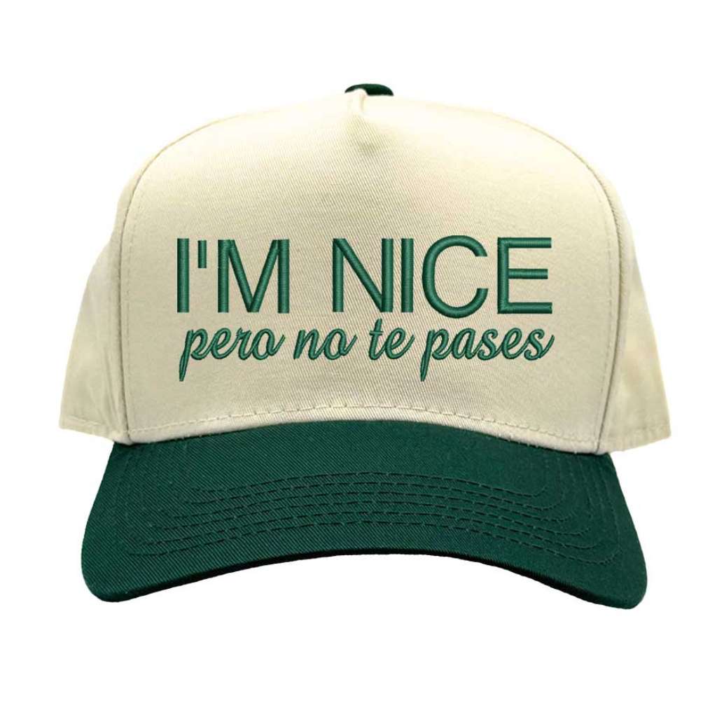 Beige and green cap with text &