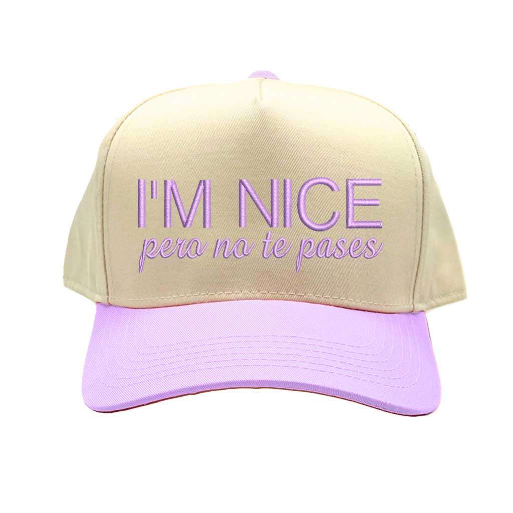 Beige and purple cap with text &