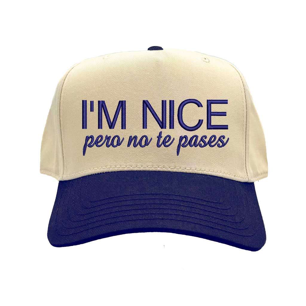 Beige and blue cap with text &