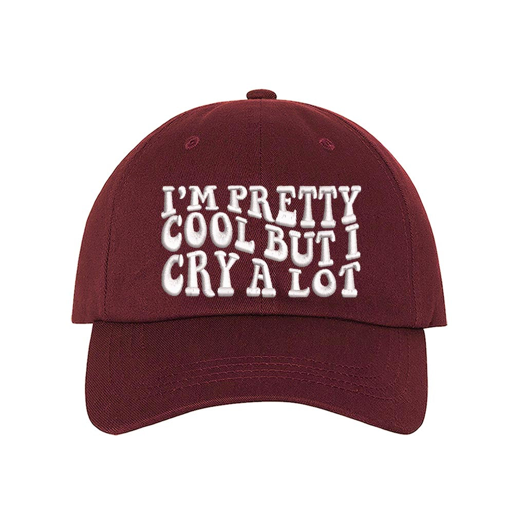Burgundy baseball hat embroidered with the phrase im pretty cool but I cry alot-DSY Lifestyle
