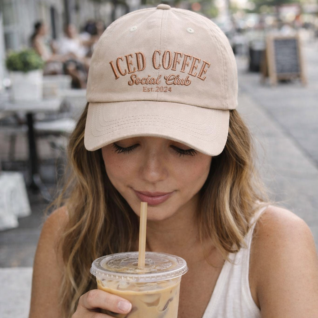 Woman wearing a embroidered ICED COFFEE Social Club&