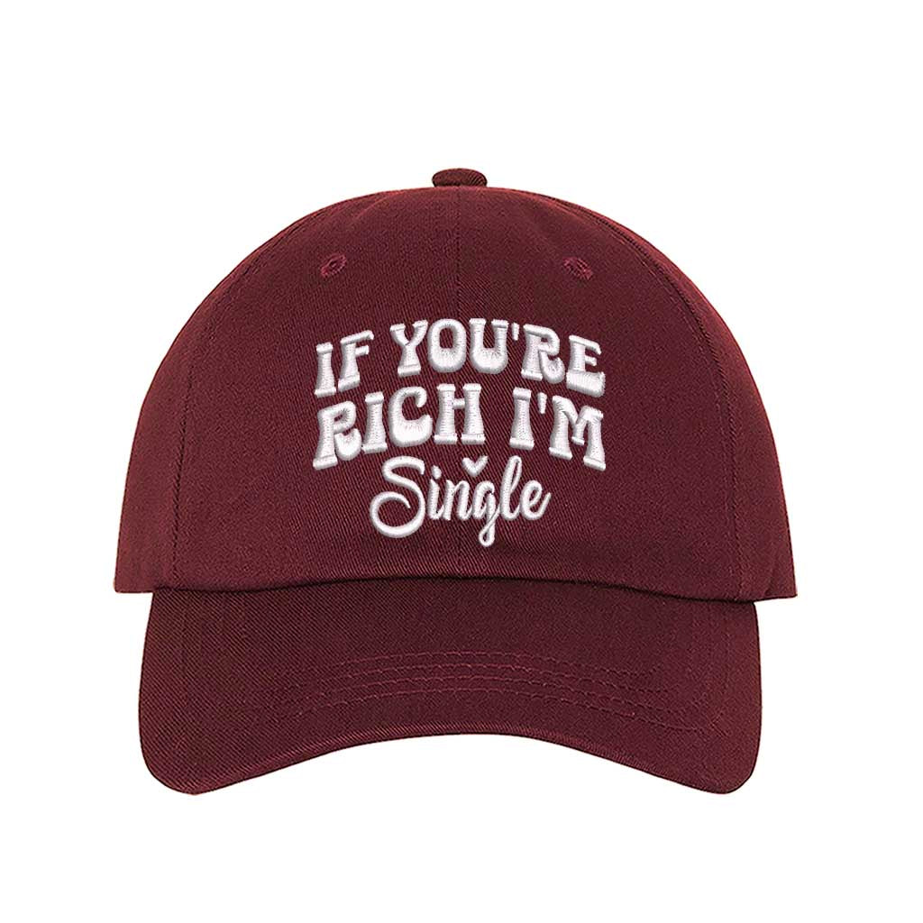 Burgundy If You’re Rich I’m Single Embroidered Baseball Hat in soft cotton with pre-curved brim and adjustable hook and loop closure. DSY Lifestyle.