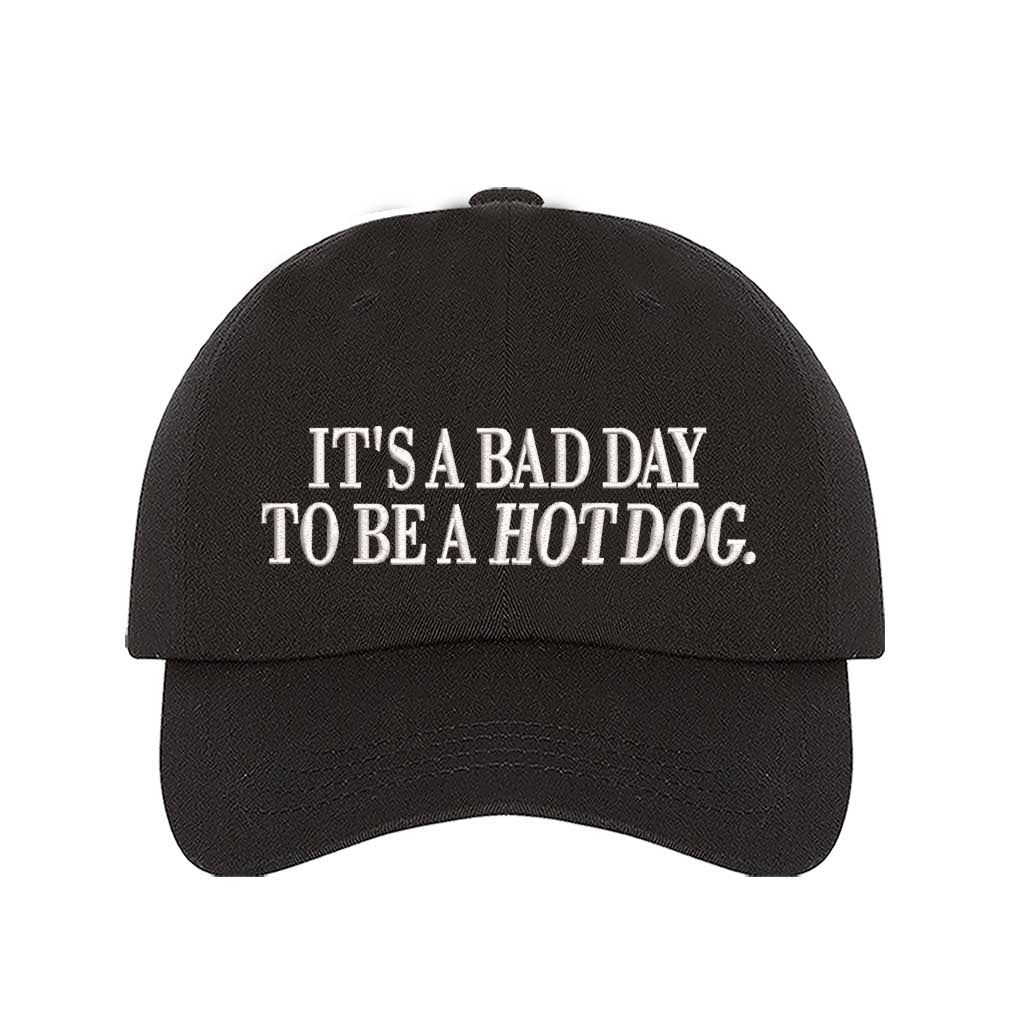 Black embroidered baseball hat with the phrase “It’s a Bad Day to Be a Hotdog” — perfect for BBQs and summer parties. - DSY Lifestyle